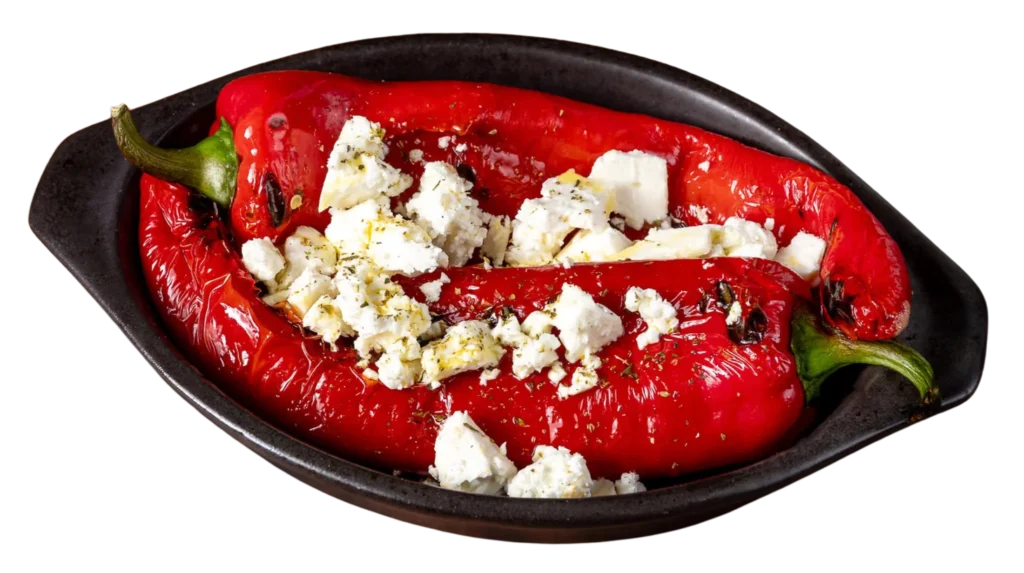 Roasted peppers with feta cheese in the wood oven